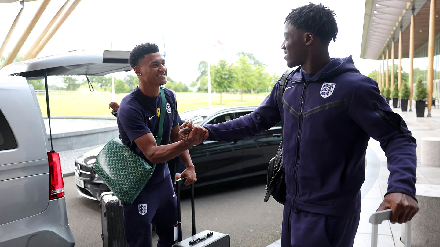 Ollie Watkins and Kobbie Mainoo of England arrive at St George's Park