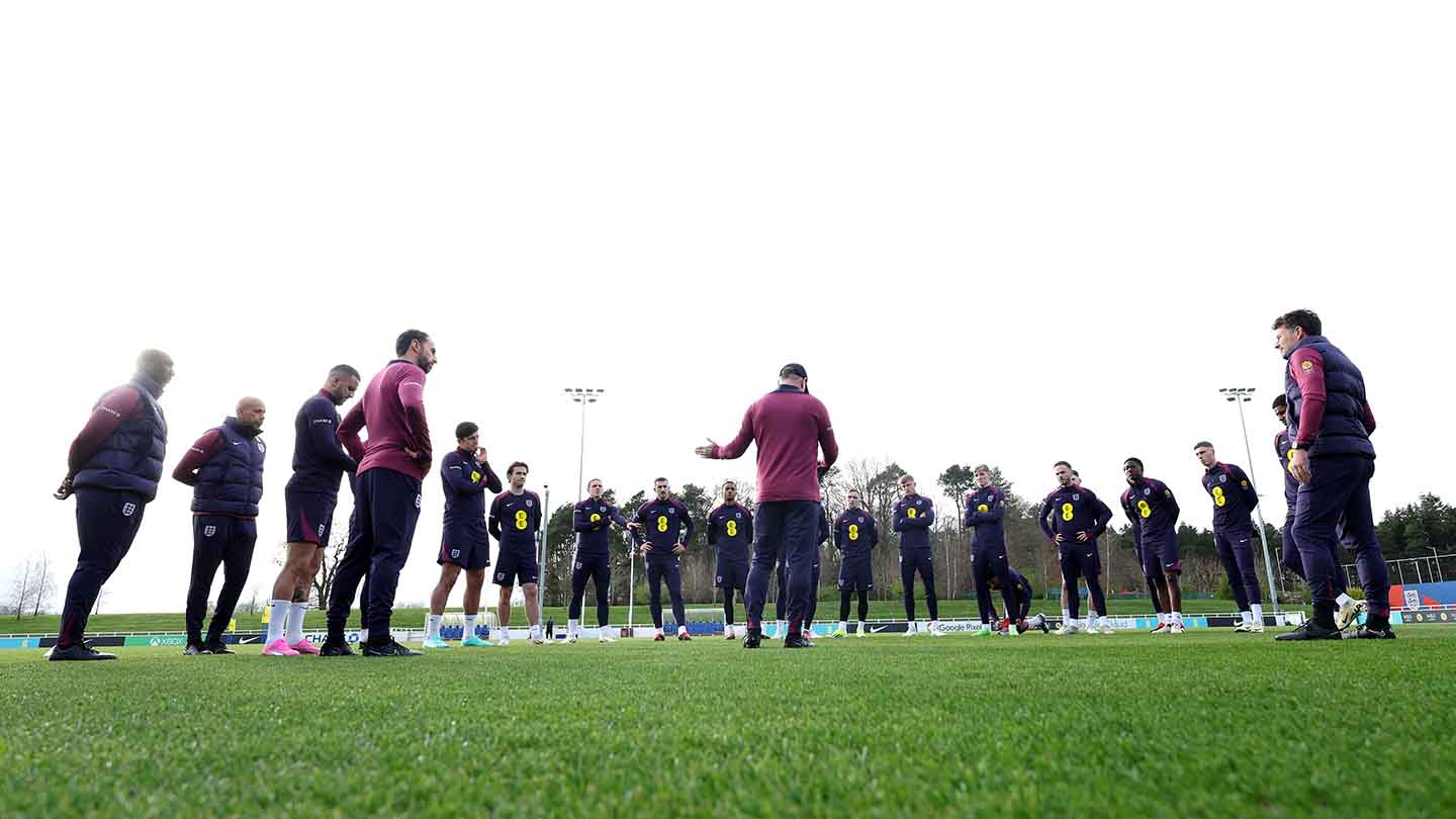 England manager Gareth Southgate speaks to his players in training at St. George's Park